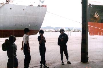 TgX`